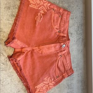 Light red jean shorts